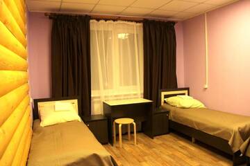 Односпальная кровать в общем номере в Гостинице Sibir Hotel Yakutsk